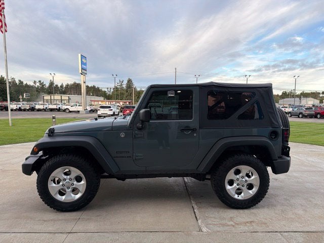 Used 2014 Jeep Wrangler Sport with VIN 1C4AJWAG2EL121585 for sale in Gaylord, MI