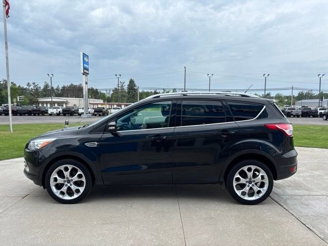 Used 2014 Ford Escape Titanium with VIN 1FMCU9J93EUB61005 for sale in Gaylord, MI